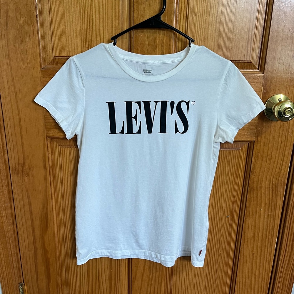 LEVI’S, small, white t-shirt with black lettering, never worn
